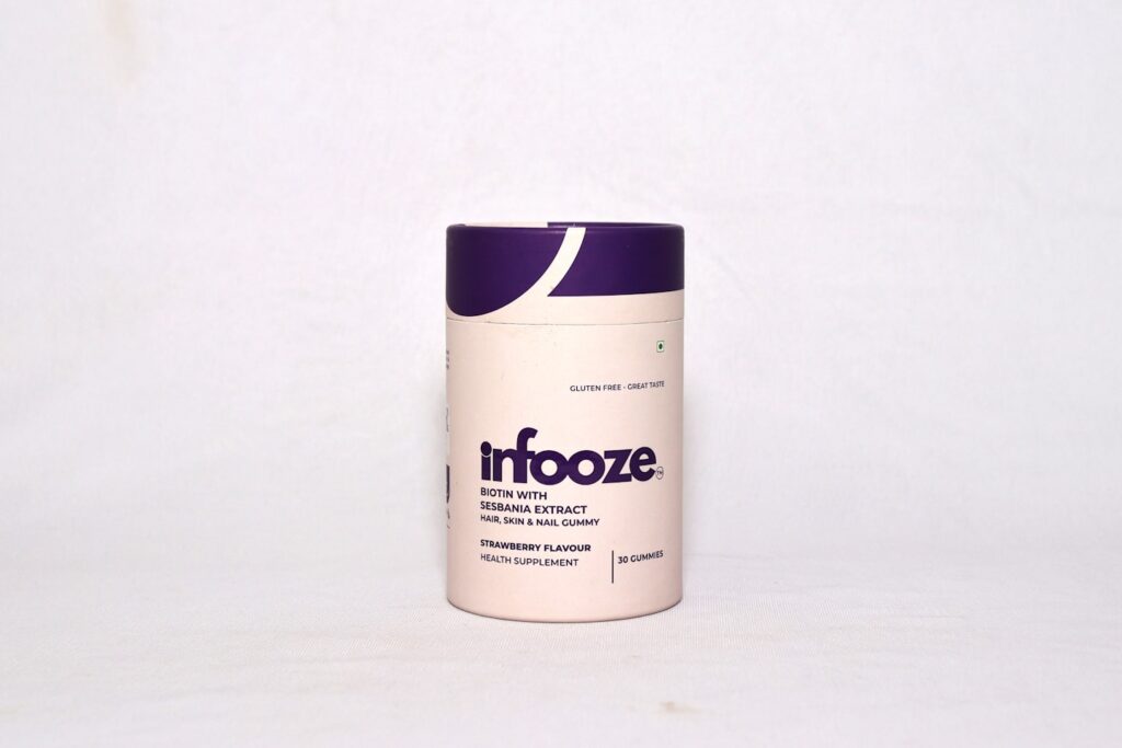 A container of infooze dietary supplement.